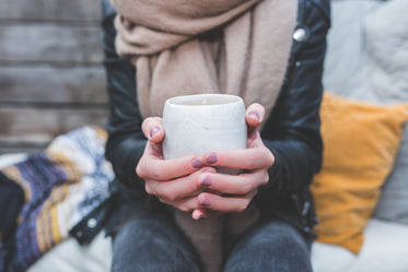 woman holding coffee mug