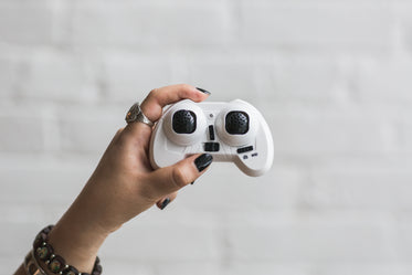 woman holding controller