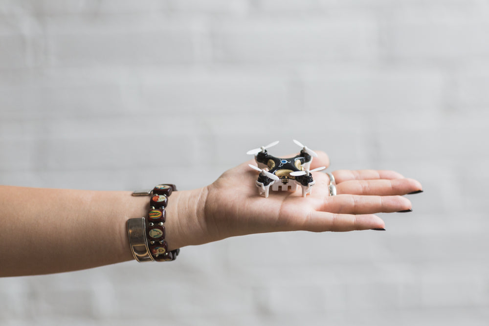 woman holding drone