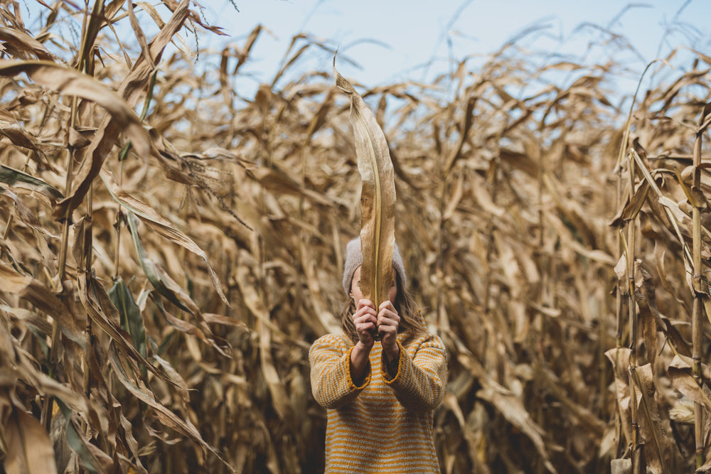 woman holding harvest plant