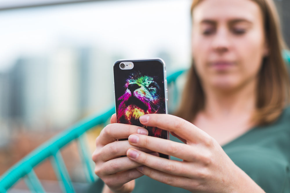 woman holding smart phone