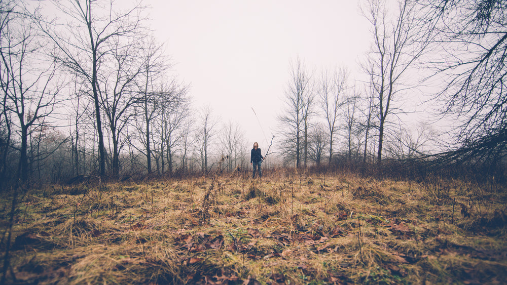 woman holding stick