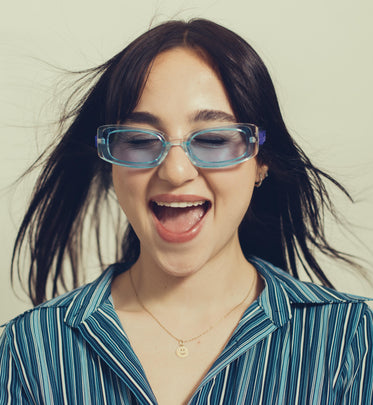 woman in blue tinted sunglasses