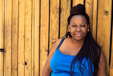 woman in glasses with long braids