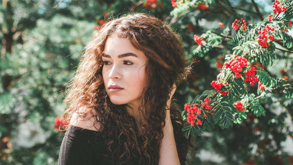 woman in red floral tree