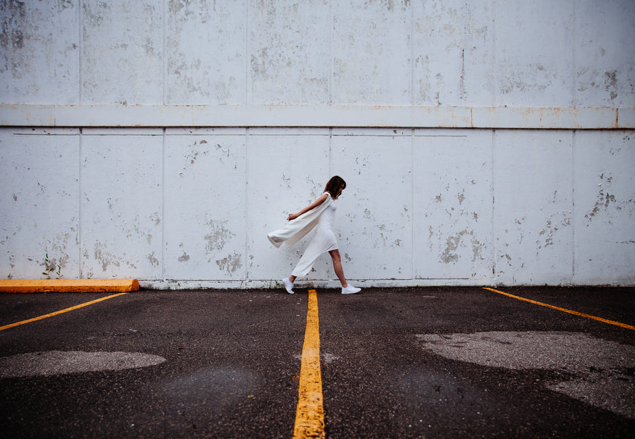 Woman wearing a white dress outdoors