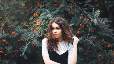 Browse Free HD Images of Woman In Front Of Tree With Berries