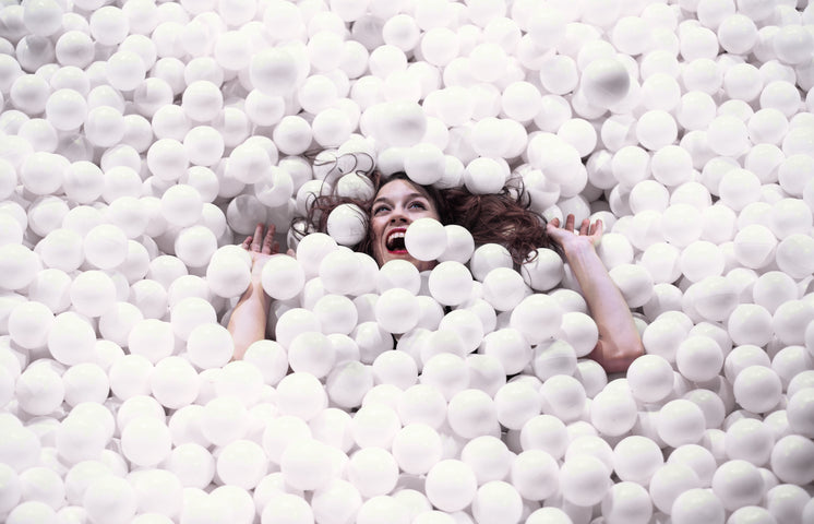 Woman Is Swallowed Up By A Pool Of Styrofoam Balls