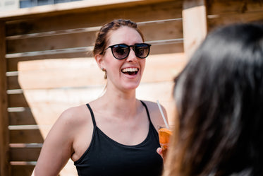 woman laughing on patio