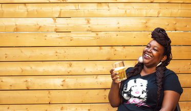 woman laughs on deck in summer