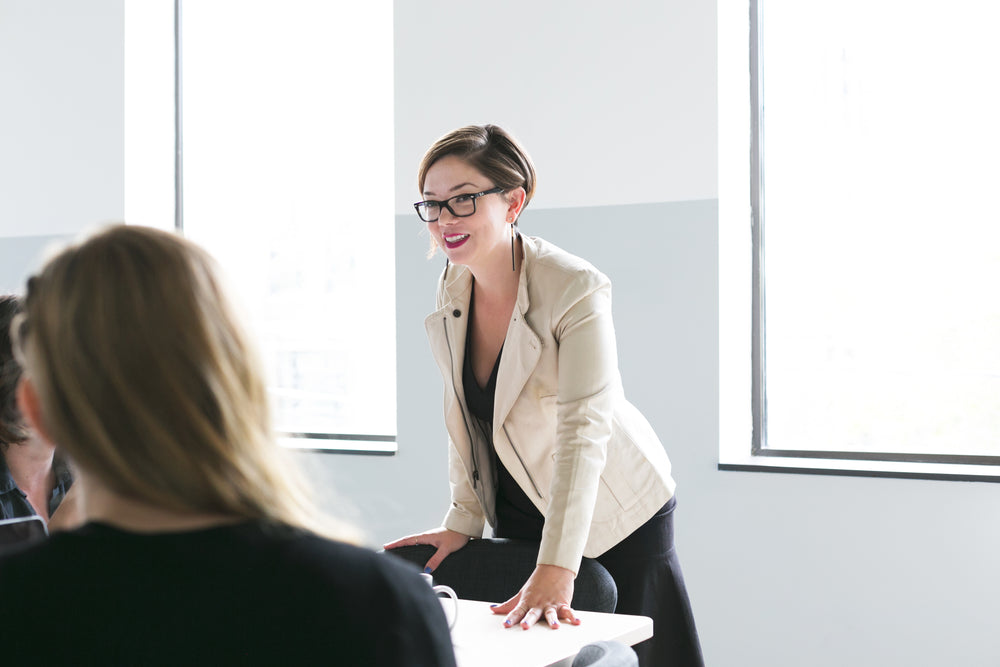 woman leads team meeting