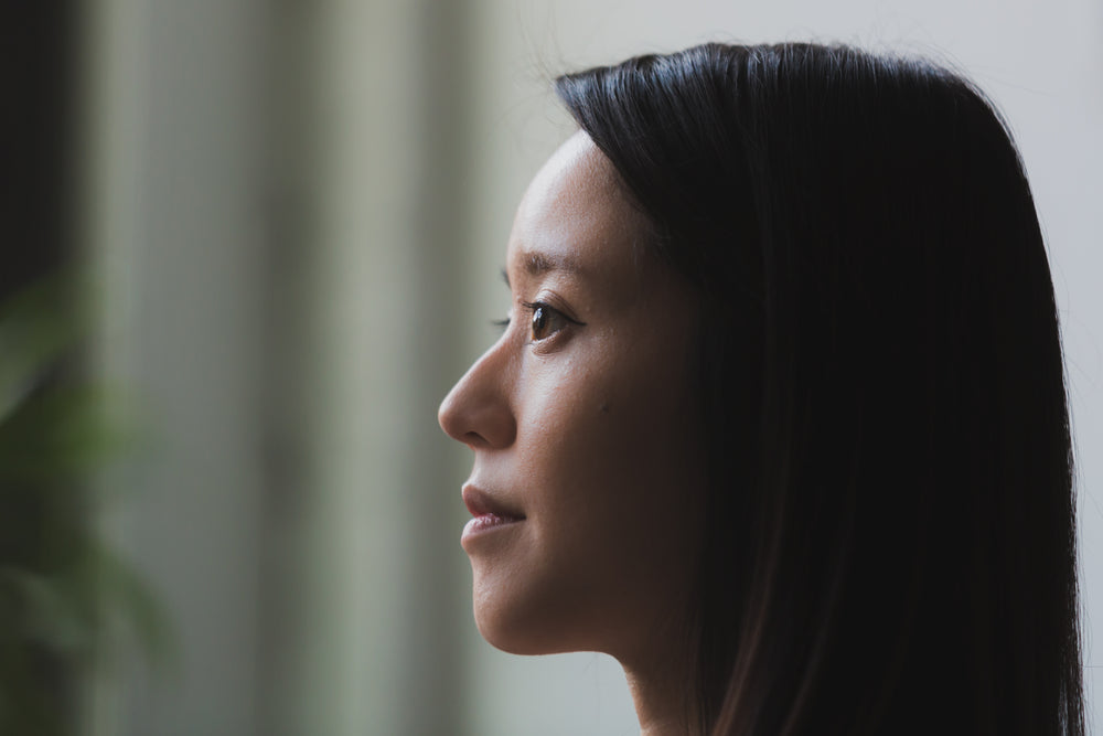 woman looking in natural light