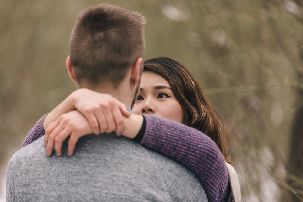 woman looks deep into her partner's eyes