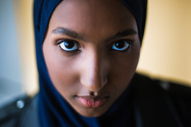 woman looks directly into camera