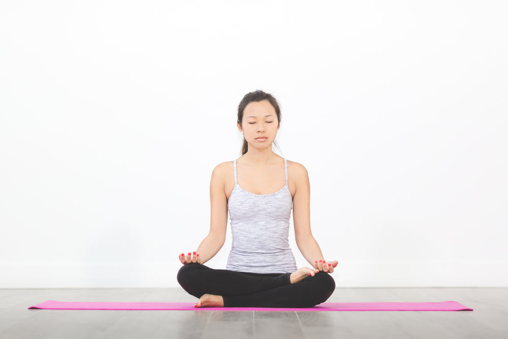 woman meditating hip opener