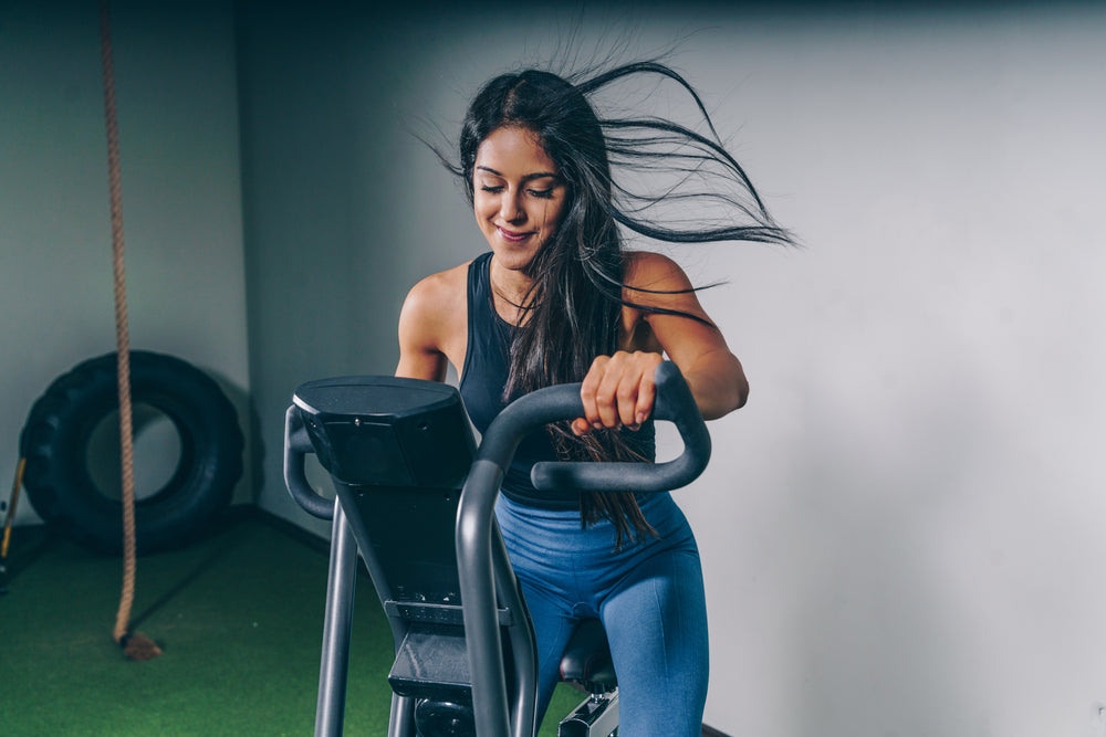 woman on exercise bike