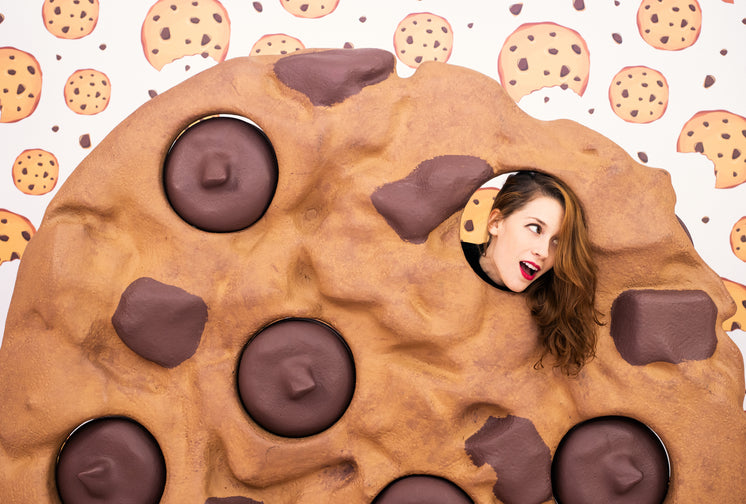 https://burst.shopifycdn.com/photos/woman-pokes-her-head-through-a-hole-in-a-giant-cookie.jpg?width=746&format=pjpg&exif=0&iptc=0