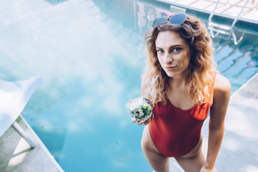 woman poolside drink