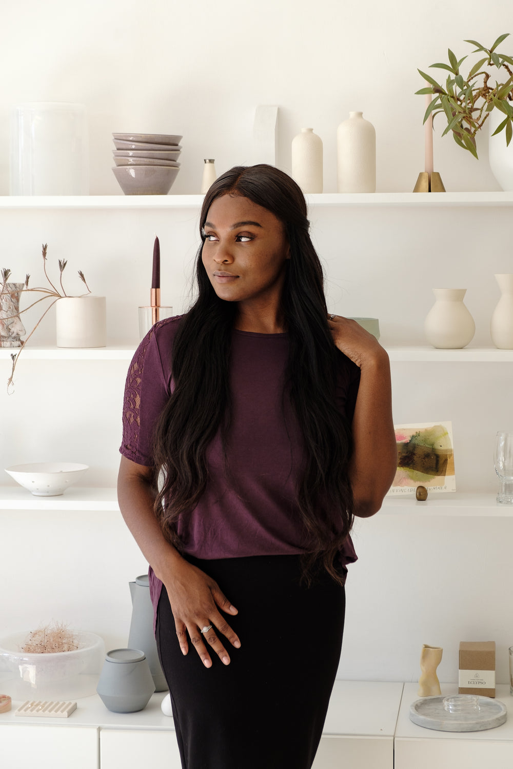 woman poses in retail store