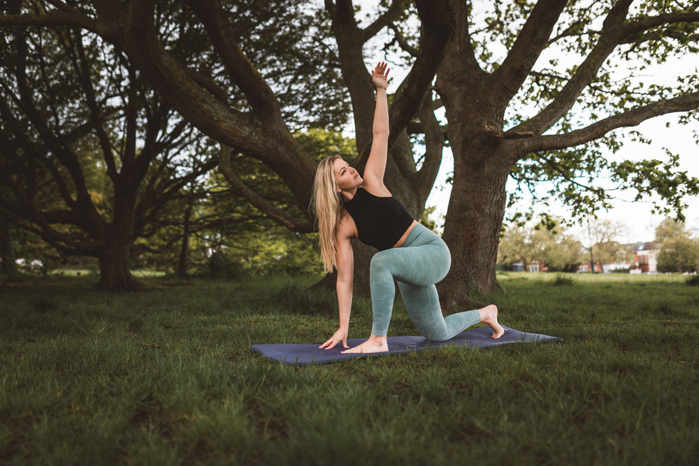 Tall Young athletic woman stretching in park getting ready to workout Stock  Photo