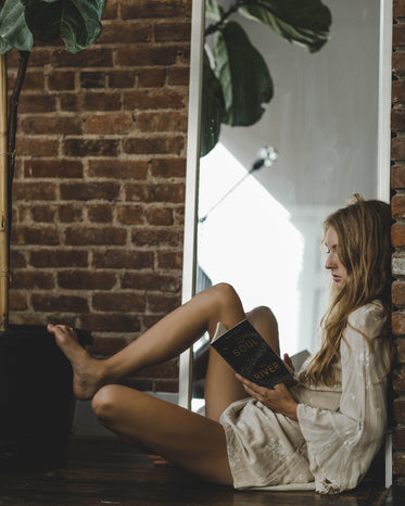 woman reads alone