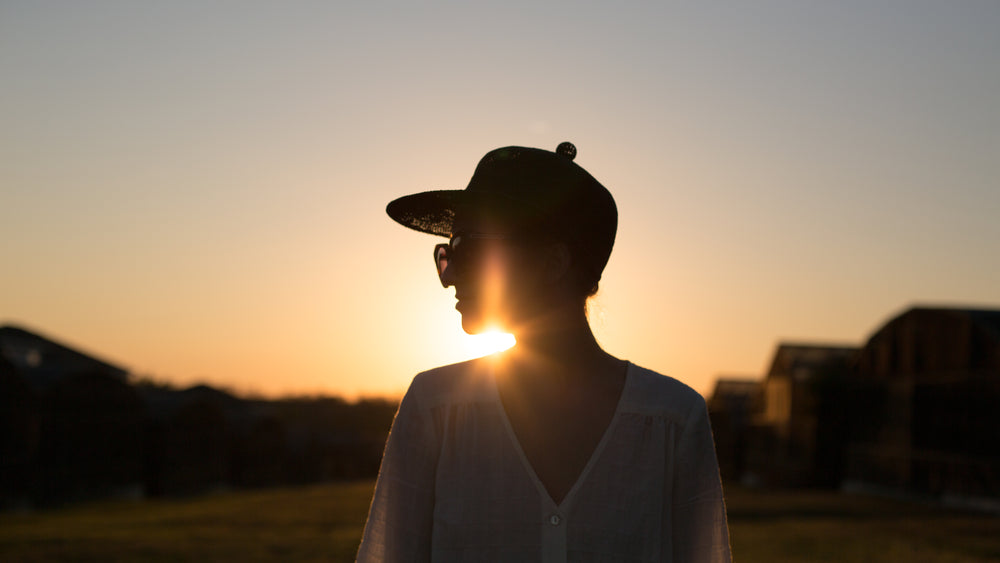 woman silhouette sunset