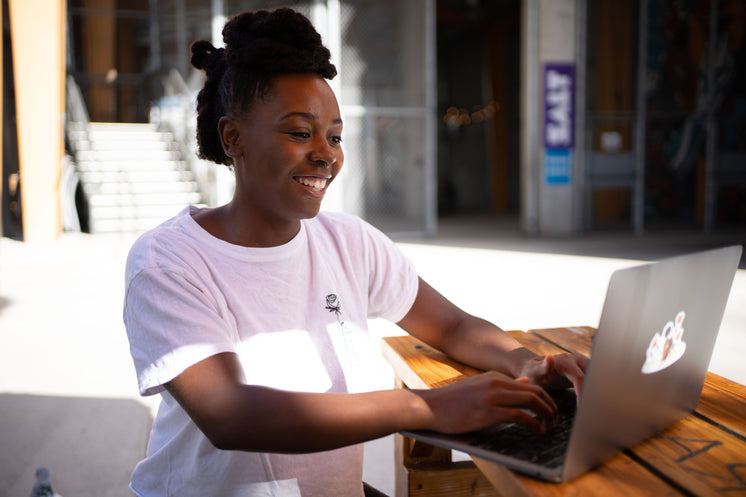 https://burst.shopifycdn.com/photos/woman-sits-at-wooden-table-and-works-on-a-laptop.jpg?width=746&format=pjpg&exif=0&iptc=0