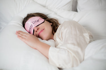 woman sleeping withsleep mask