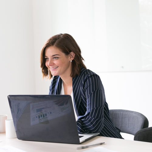 Woman Smiling With Laptop