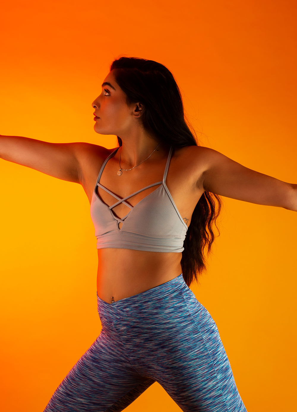 woman stretches in yoga flow