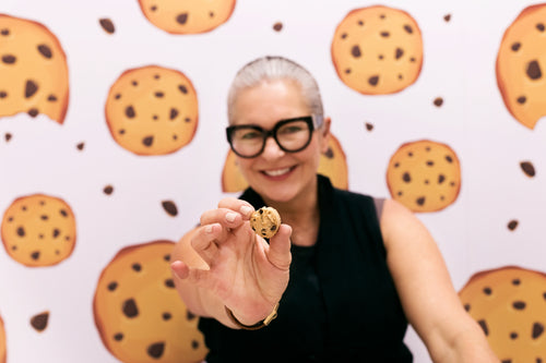 woman surrounded by cookies