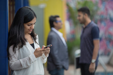 woman texting in india