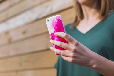 woman texting on smartphone