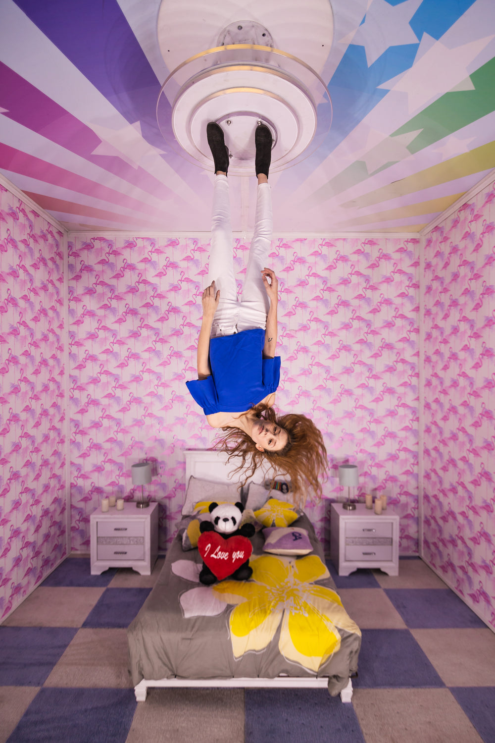 woman tossing hair hanign from ceiling