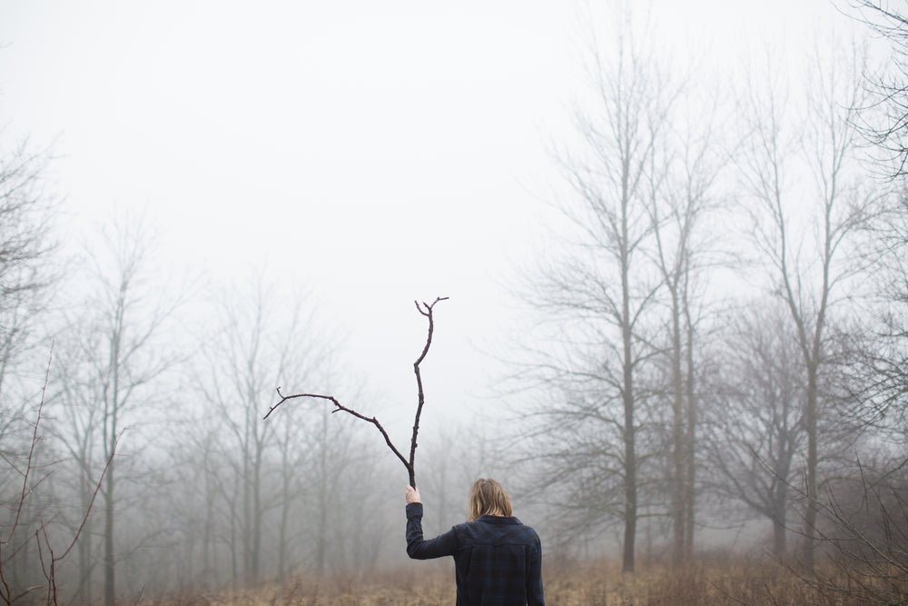 woman wandering in forest