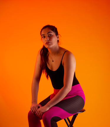 woman wearing pink and black fitness clothing