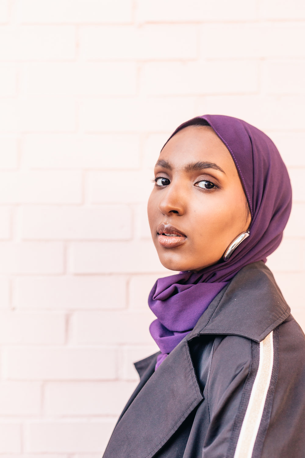 woman wearing purple