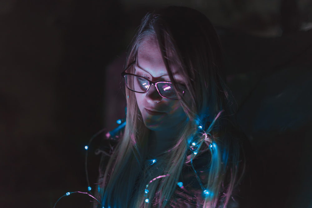 woman with blue lights