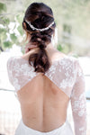 woman with braided hair and wedding dress