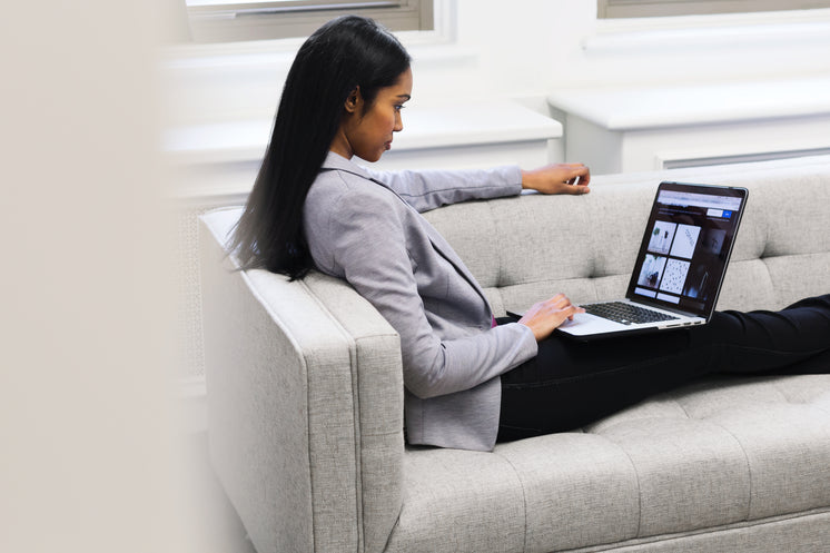 woman-with-laptop-on-couch.jpg?width=746