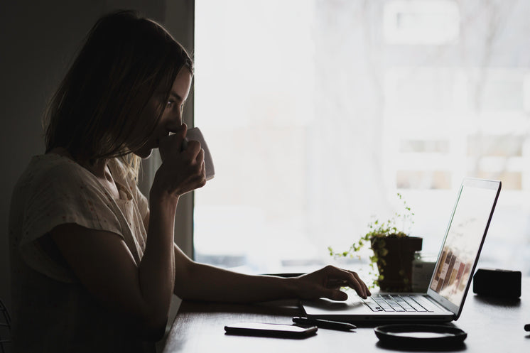 Woman Working On Laptop