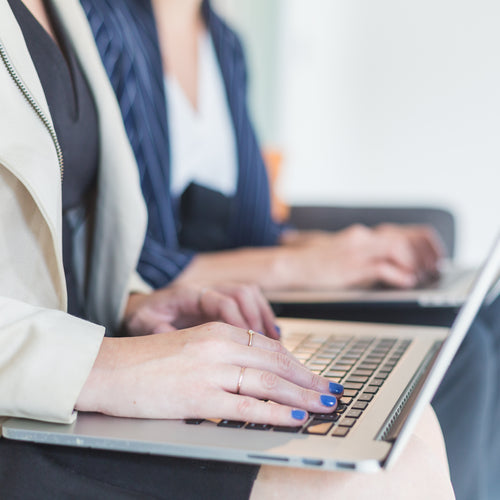 Womans Hands Working On Laptop