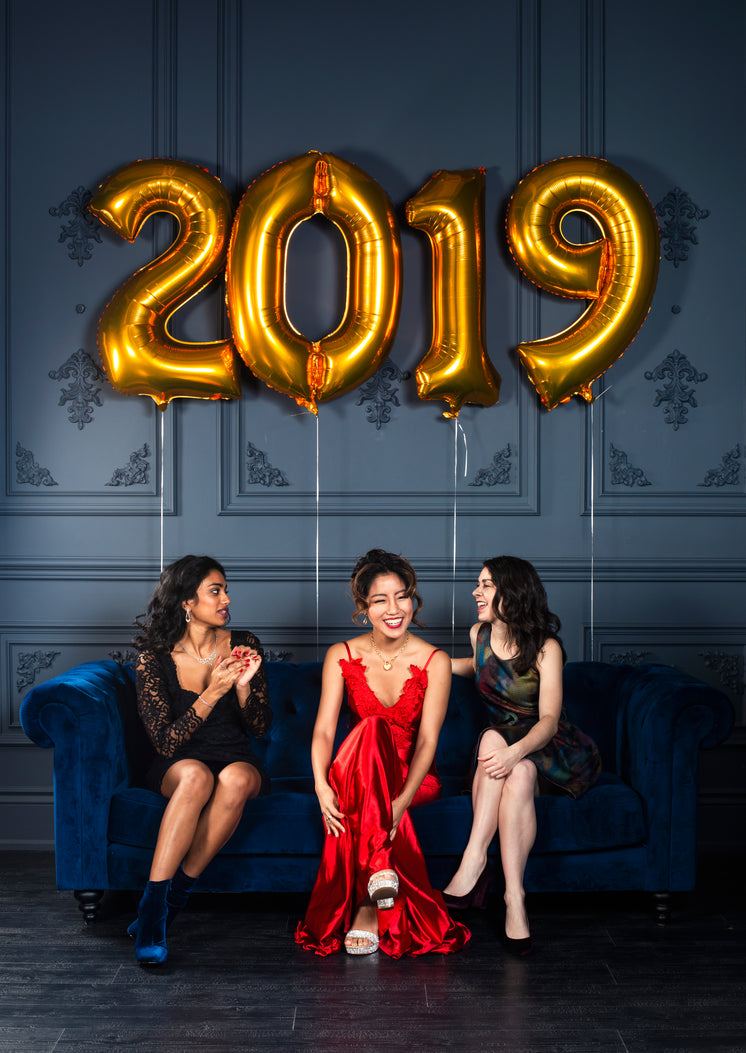 women-chatting-on-blue-velvet-couch.jpg?width=746&format=pjpg&exif=0&iptc=0