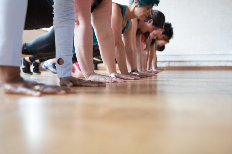 Women In A Row Plank Pose