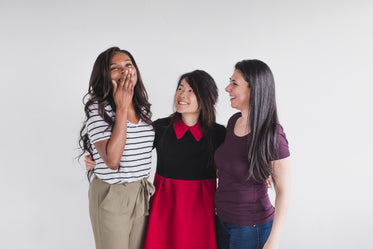 women smiling and laughing together