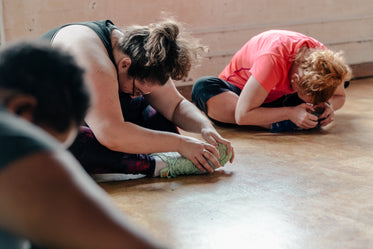women stretching in exercise class