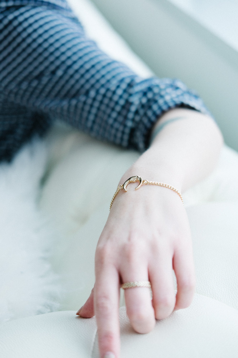 moon bracelet on women's hand