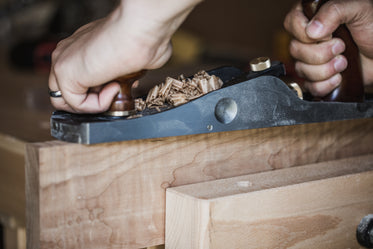 wood curls on a hand plane