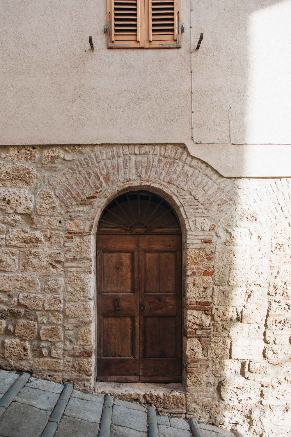 wood door in a stone wall