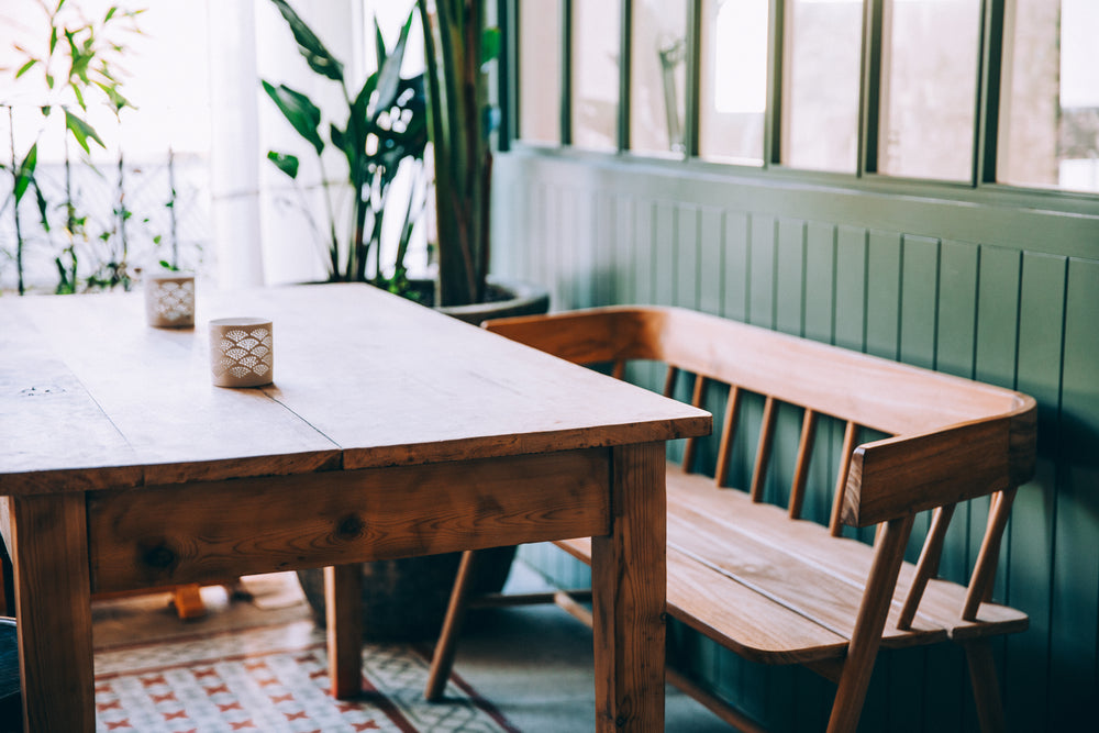 wooden bench and table in the sun